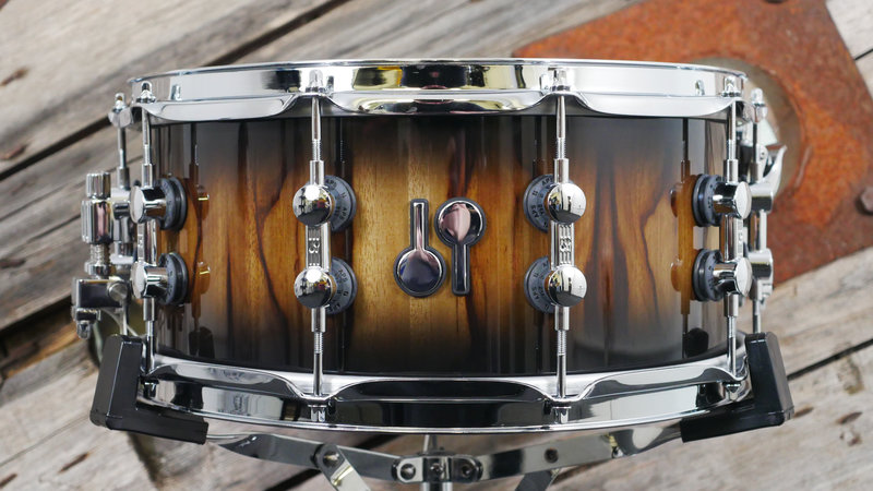 Sonor SQ2 14 x 6.5 Medium Birch Snare Drum in Black Burst over African Marble 2